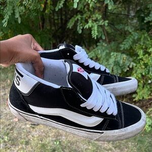 Vans Classic Black and White High-Top Sneakers